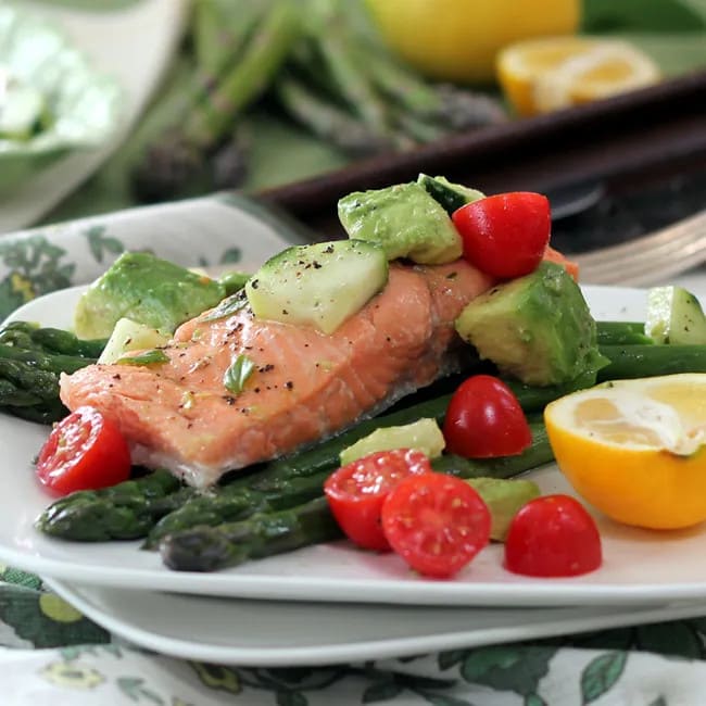 SALMON POACHED IN OIL WITH AVOCADO SALAD & ASPARAGUS