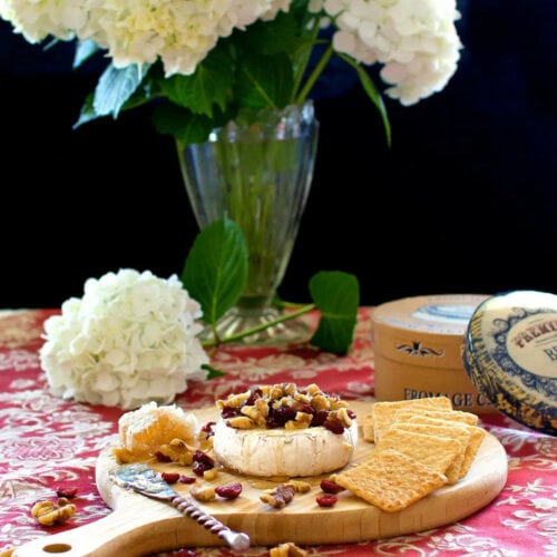 BAKED BRIE WITH WALNUTS, CRANBERRIES & HONEY