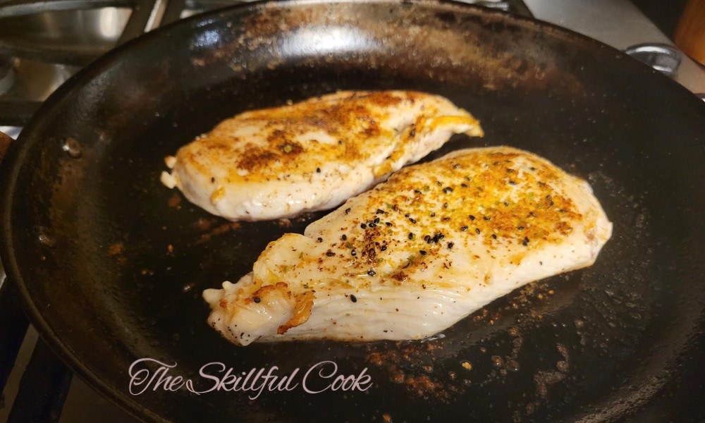 https://theskillfulcook.com/wp-content/uploads/2023/10/Cooking-Chicken-Breast-on-Misen-carbon-steel-pan.jpg