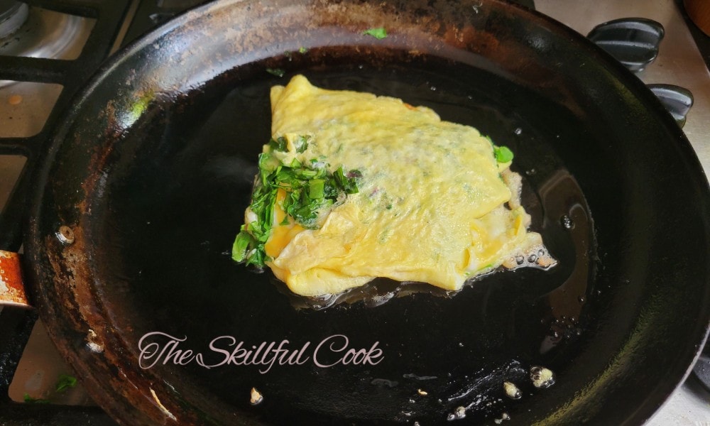 Omelet on a seasoned carbon steel pan
