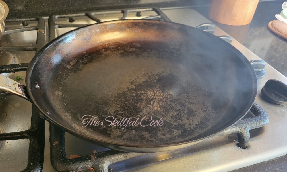 high fumes on a carbon steel pan during seasoning