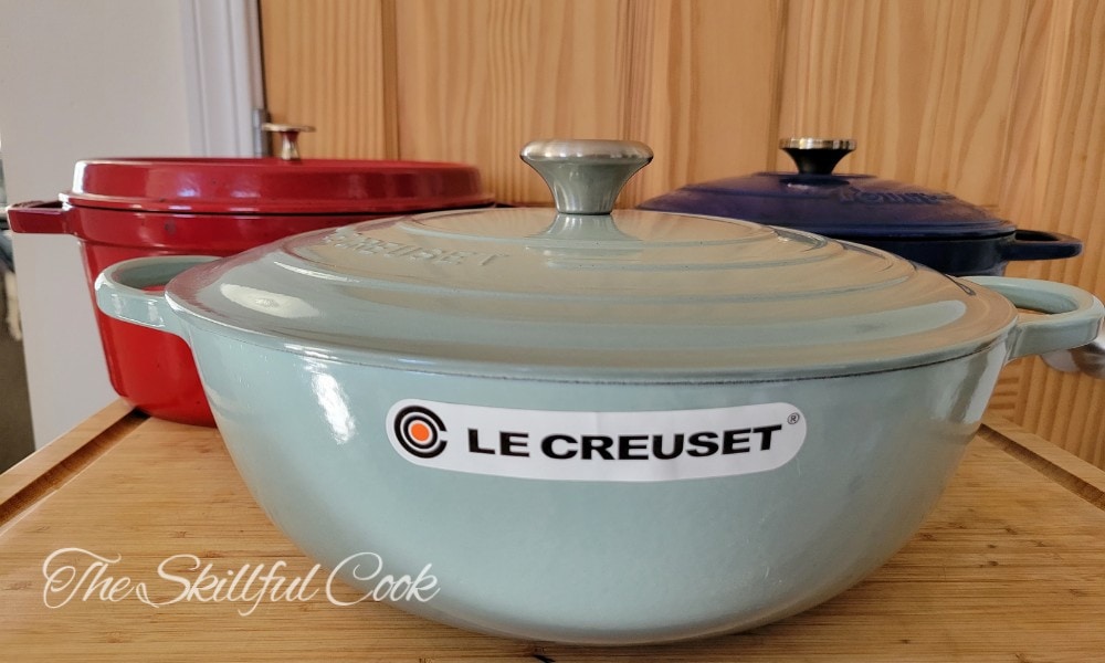 Different colors and brands of enameled cast iron
