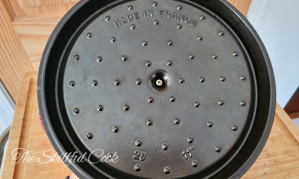 Staub spikes on the interior side of the lid