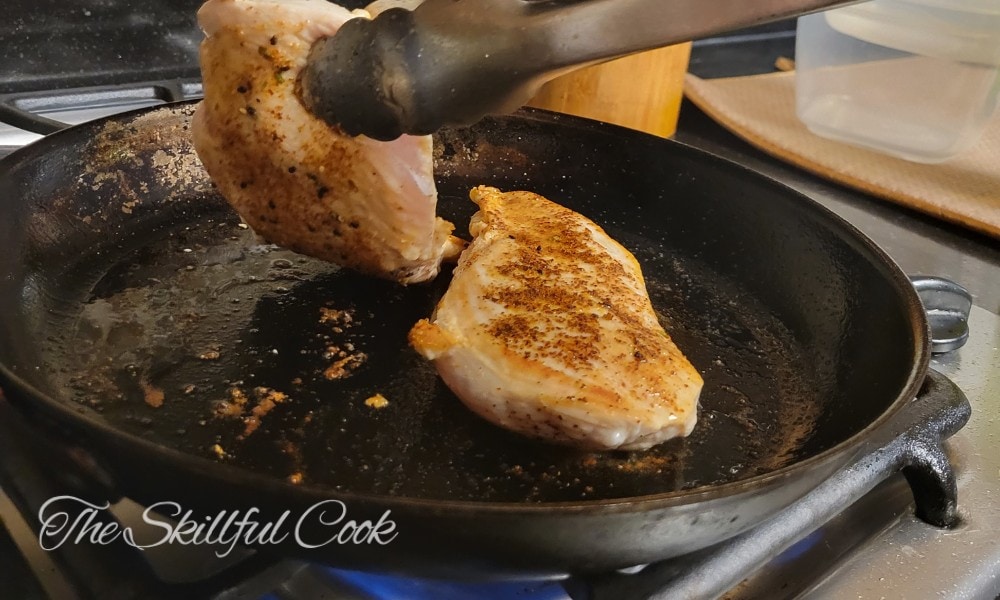 cooking chicken on a carbon steel pan