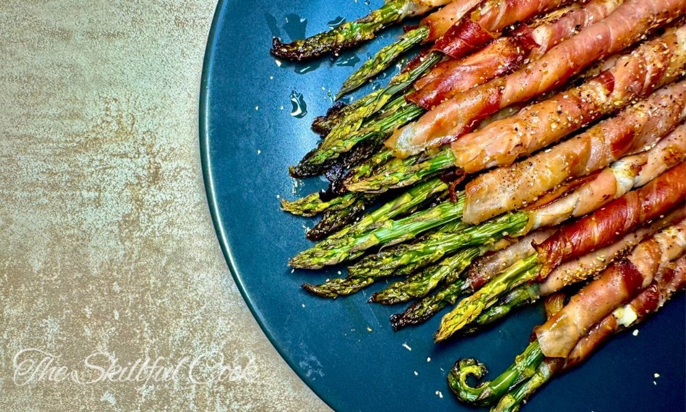 Asparagus roasted with prosciutto with a layer of cream cheese